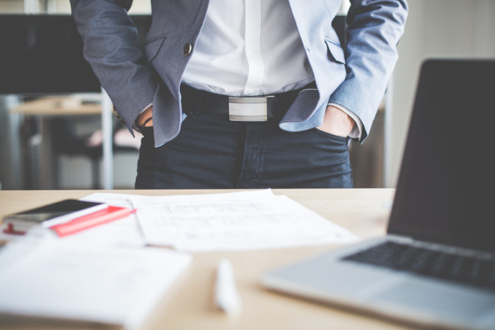 Businessman Standing in his Office